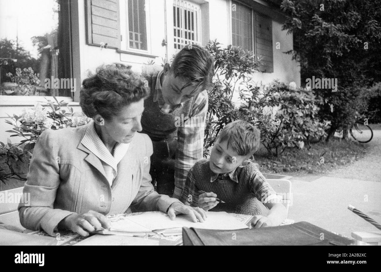 Margarete Speer, wife of Albert Speer, sits with her sons Ernst (right ...