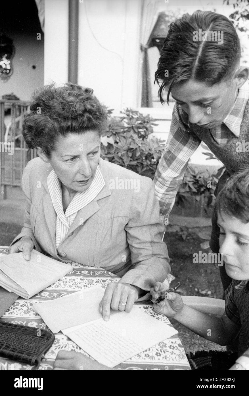 Margarete Speer, wife of Albert Speer, sits with her sons Ernst (right ...