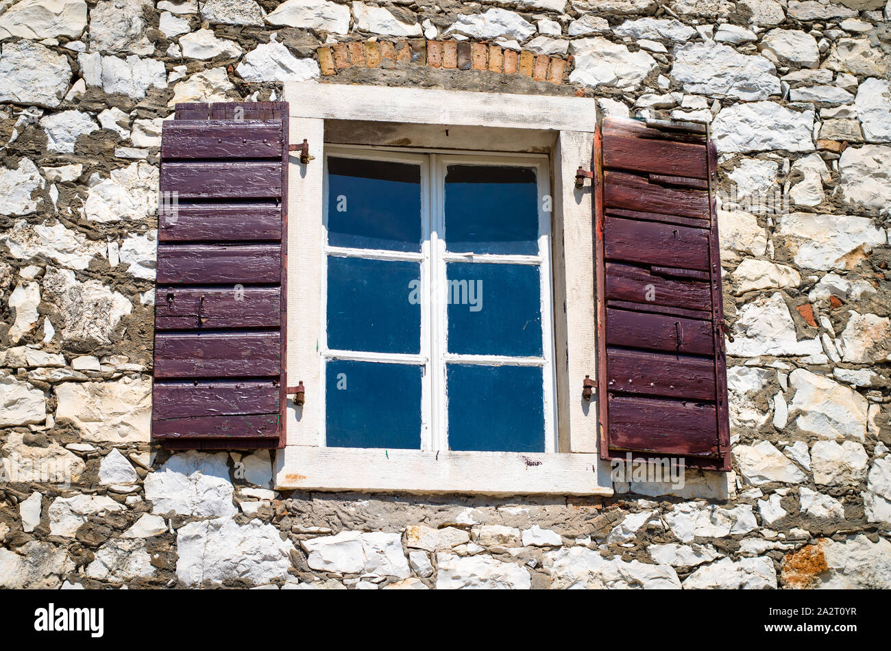 open windows in stone wall Stock Photo