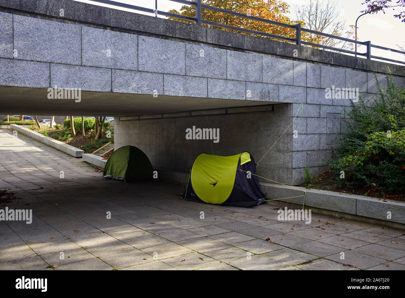 Homeless people living in tents under a flyover in the centre of Milton Keynes, Bedfordshire Stock Photo