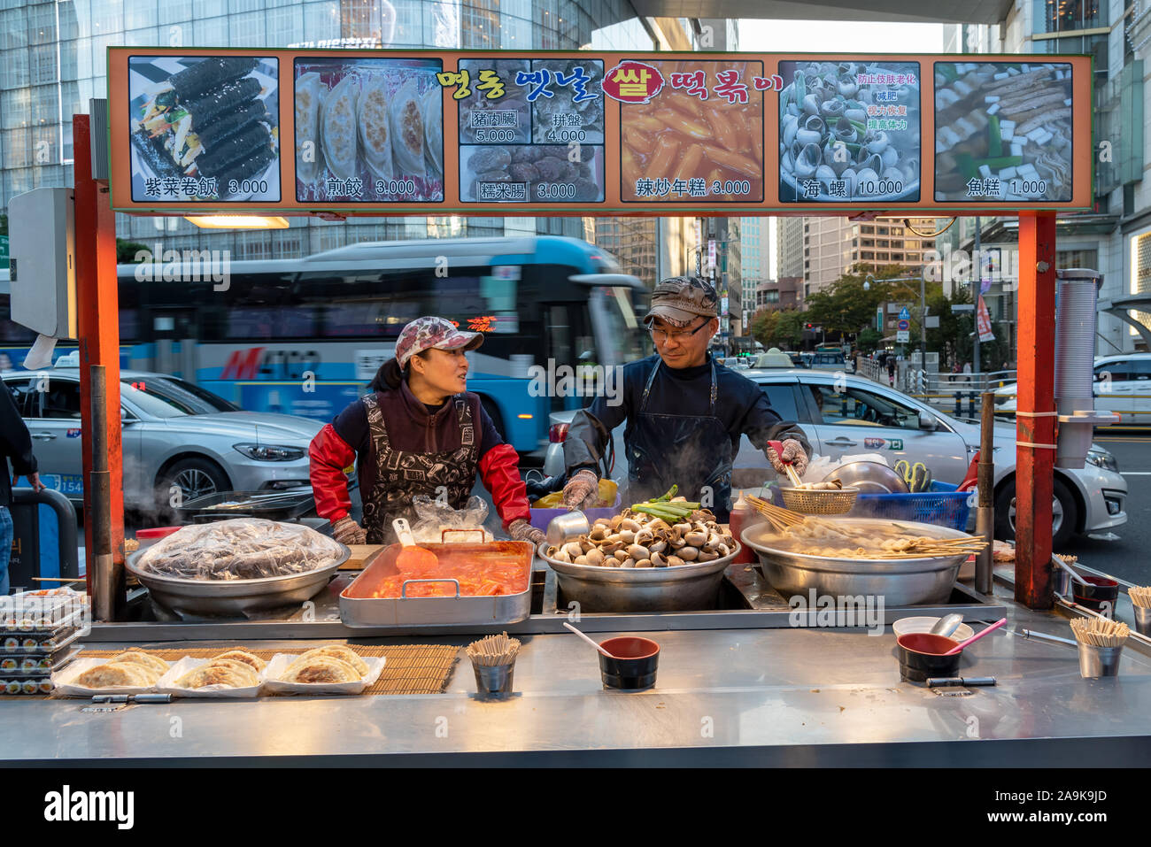 Seoul, South Korea - November 04, 2019: Food stall in Myeongdong street market. Myeong Dong district is a popular shopping and street food market in S Stock Photo