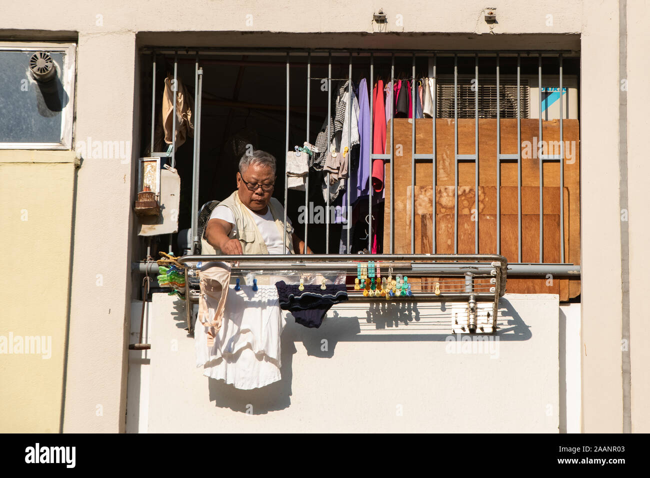 Hanging out washing in an apartment in the Choi Hung Estate in Hong Kong Stock Photo