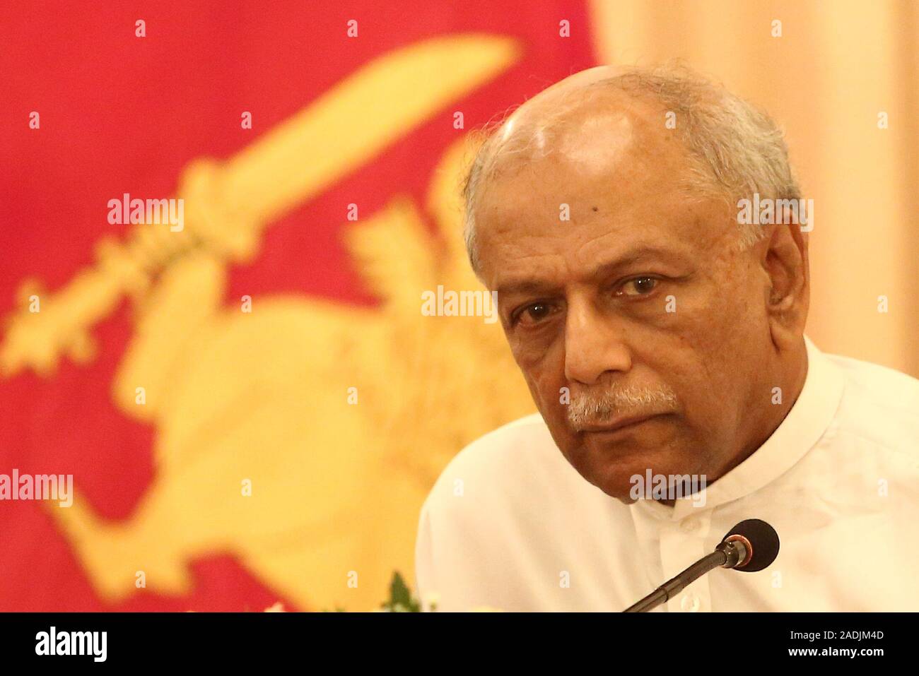 Colombo, Sri Lanka. 4th Dec, 2019. Sri Lanka's new foreign minister Dinesh Gunawardena speaks to media during a press conference at the Ministry of Foreign Affairs in Colombo, Sri Lanka, Wednesday, December 04, 2019. Dinesh said the government has rejected a request from the Swiss Embassy to allow one of its employees to be flown out for medical treatment after a group allegedly abducted and threatened her to disclose embassy information. Credit: Pradeep Dambarage/ZUMA Wire/Alamy Live News Stock Photo