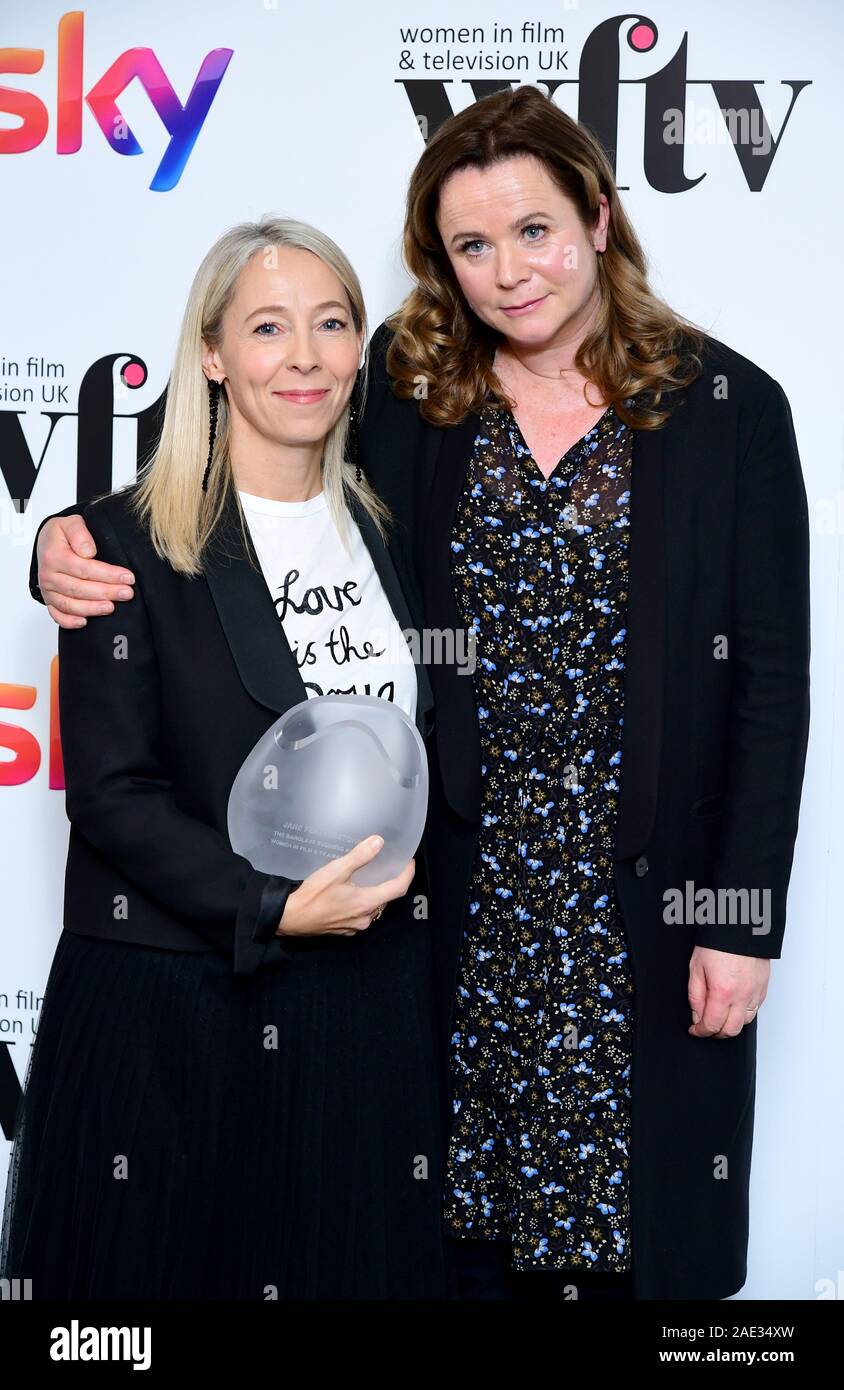 Jane Featherstone with her Barclays Business Award in the press room with Emily Watson at the Women in Film and TV Awards 2019 at the Hilton, Park Lane, London. Stock Photo