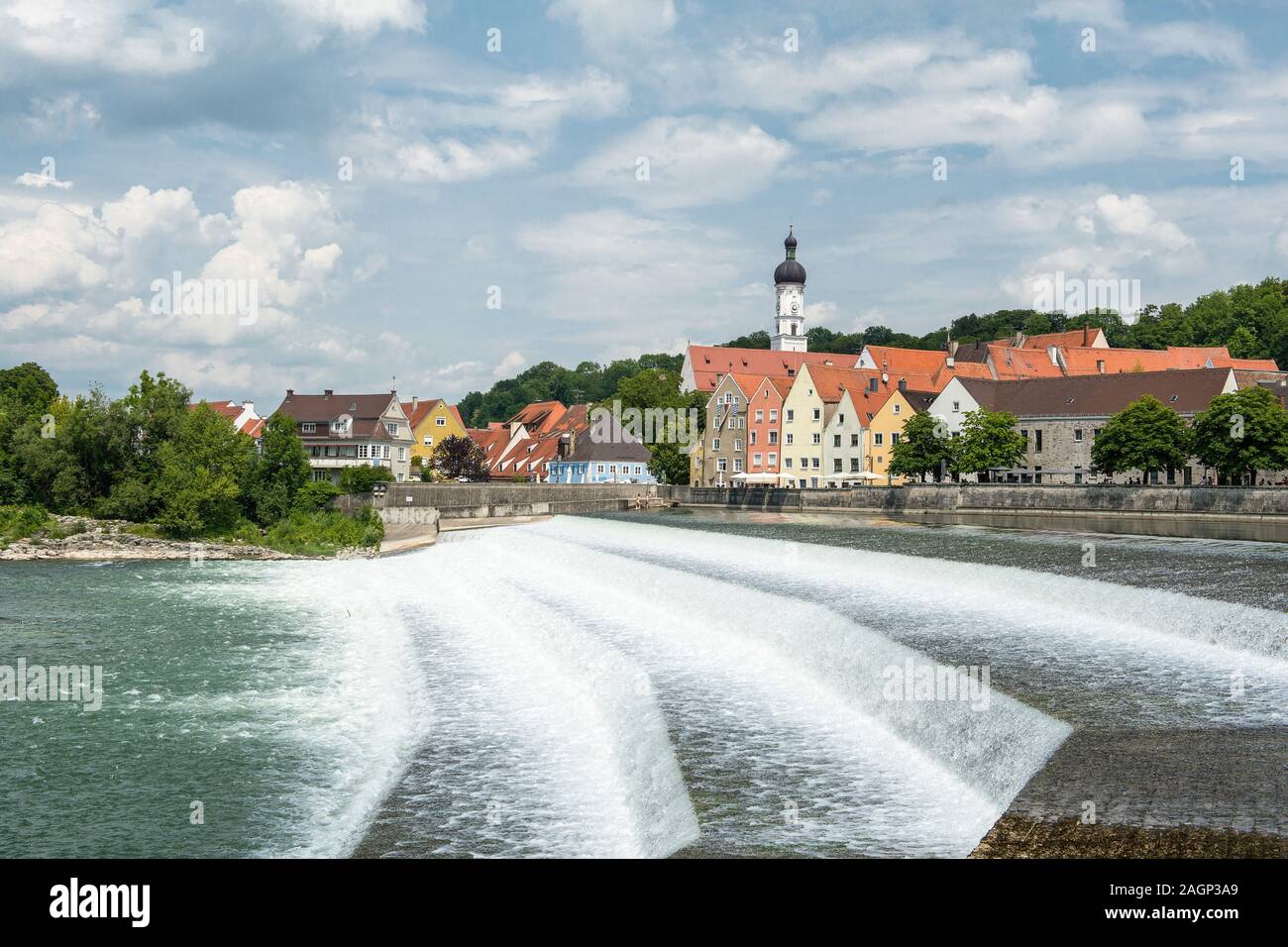 Landsberg am Lech, Bavaria, Germany - July 19, 2019 View over the man made waterfall to the city of Landberg am Lech a touristic historical city in Ba Stock Photo