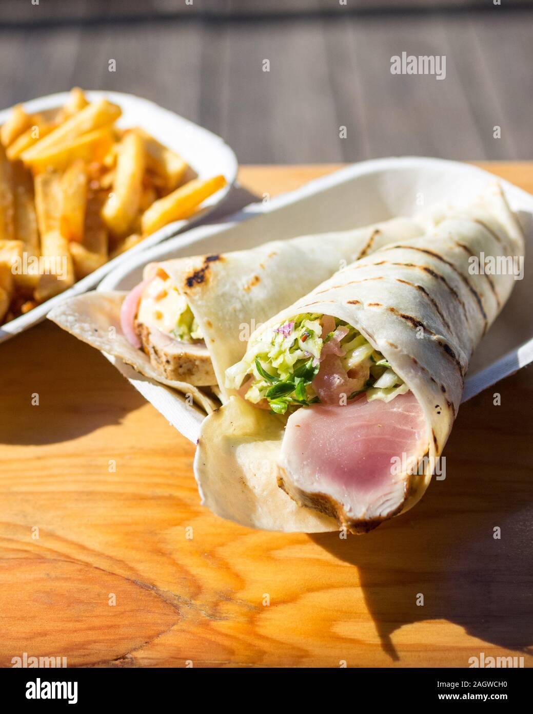 Hand-roll style albacore tuna tacos and chips from Red Fish Blue Fish Restaurant in Victoria, British Columbia, Canada. Stock Photo