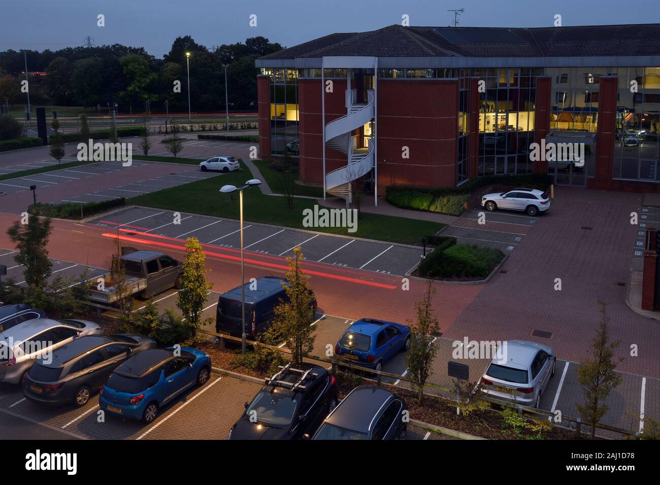 An elevated evening view looking across the carpark at Berkshire Place Winnersh Triangle Reading UK Stock Photo