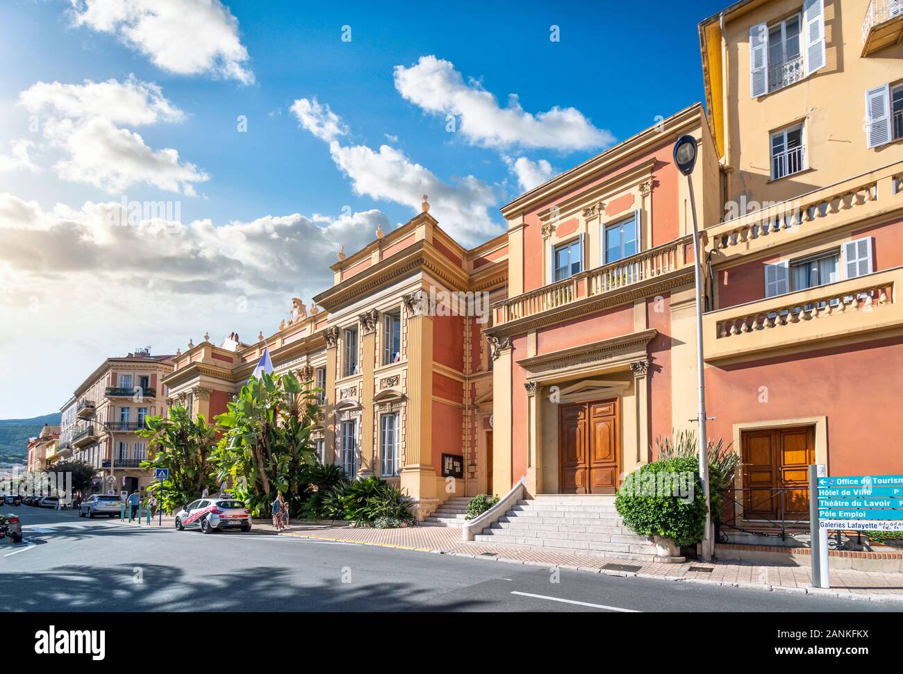 The Office of Tourism, and government buildings in the colorful historic center of Menton, France, on the French Riviera. Stock Photo