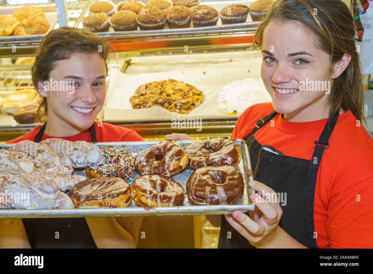 Florida Dania Beach,Grandpa's Bakery &,restaurant restaurants food dining cafe cafes,waitress server employee worker workers working staff,doughnuts,d Stock Photo