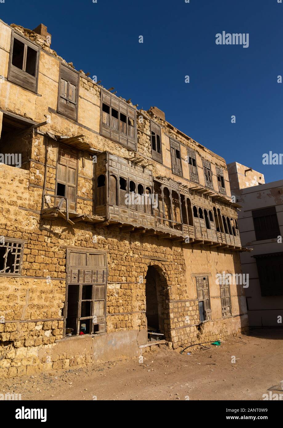 Historic dilapidated house with wooden mashrabiyas, Al Madinah Province, Yanbu, Saudi Arabia Stock Photo