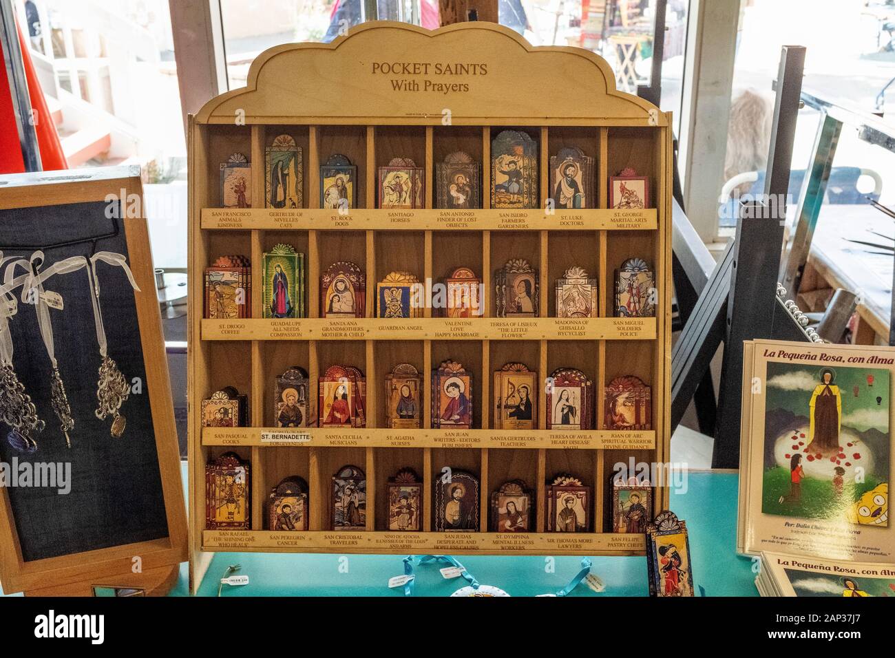 'Pocket Saints' with prayers sold in Old Town Albuquerque, New Mexico Stock Photo