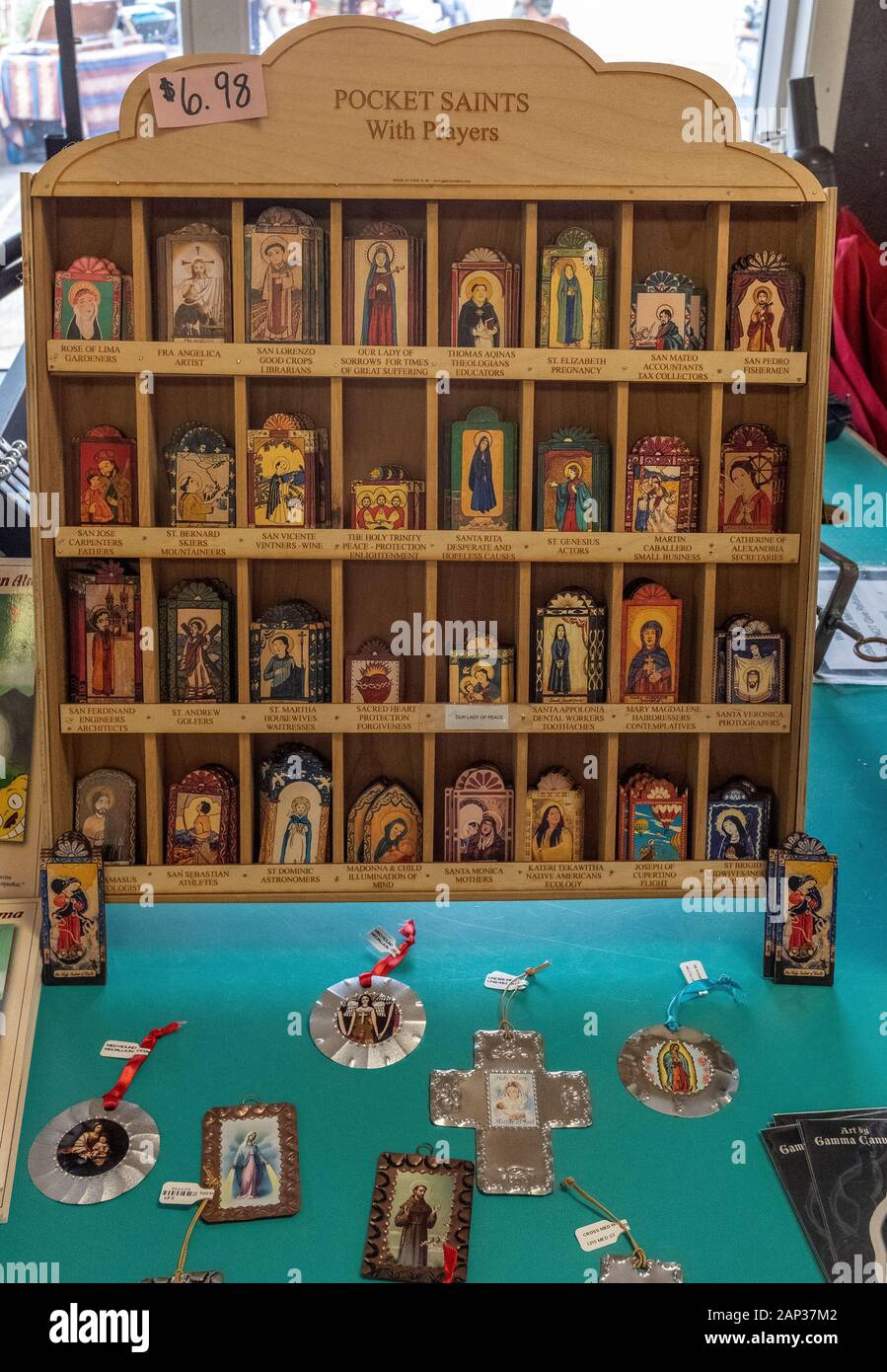 'Pocket Saints' with prayers sold in Old Town Albuquerque, New Mexico Stock Photo