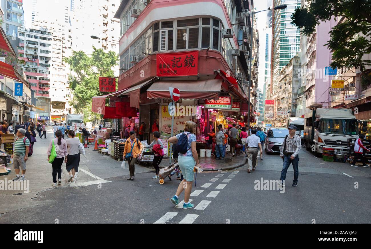 Hong Kong street scene, People walking in the Wan Chai district, Hong Kong Island, Hong Kong Asia Stock Photo