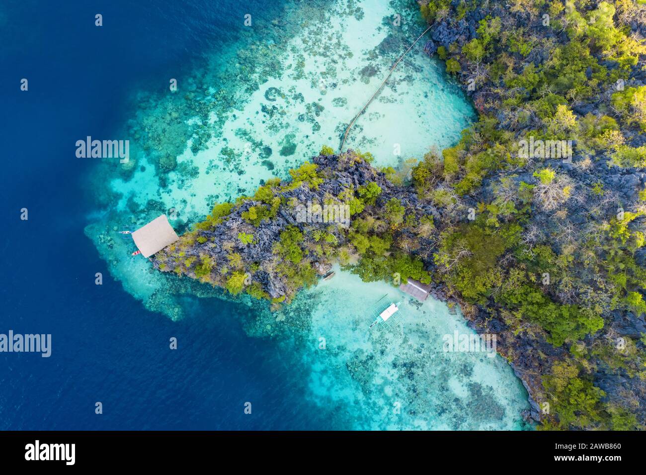 View From Above Stunning Aerial View Of An Island Surrounded By A Beautiful Coral Reef And Bathed By A Turquoise Crystal Clear Sea Stock Photo Alamy