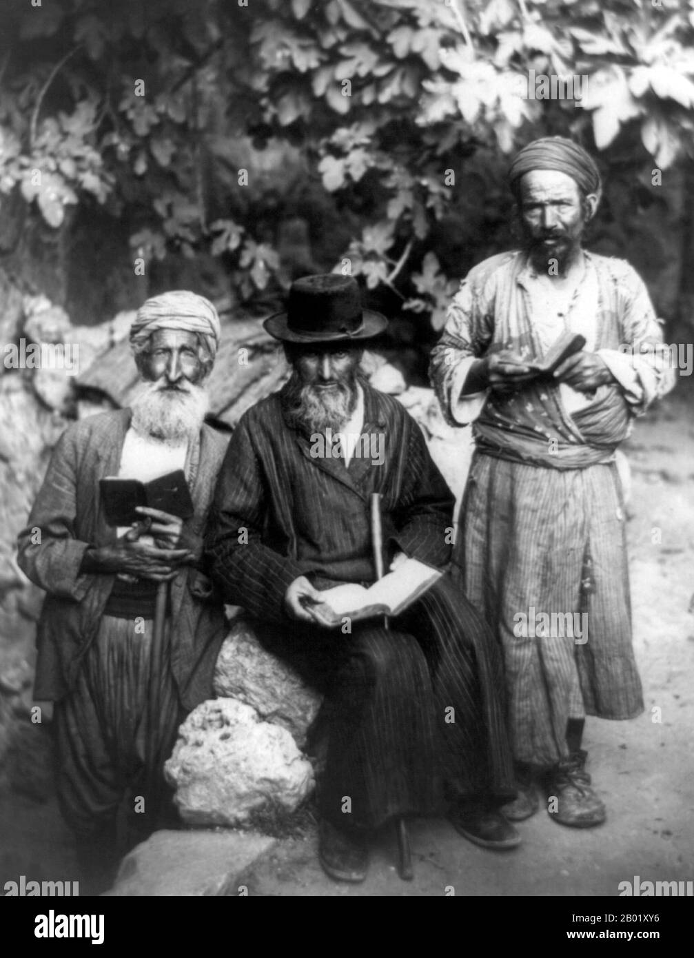 Palestine: Jews in Arab and European garb in Jerusalem, 1898-1934.  Palestine is a name given to the geographic region between the Mediterranean Sea and the Jordan River. The region is also known as the Land of Israel, the Holy Land and the Southern Levant.  In 1832 Palestine was conquered by Muhammad Ali's Egypt, but in 1840 Britain intervened and returned control of the Levant to the Ottomans in return for further capitulations. The end of the 19th century saw the beginning of Zionist immigration and the Revival of the Hebrew language. Stock Photo