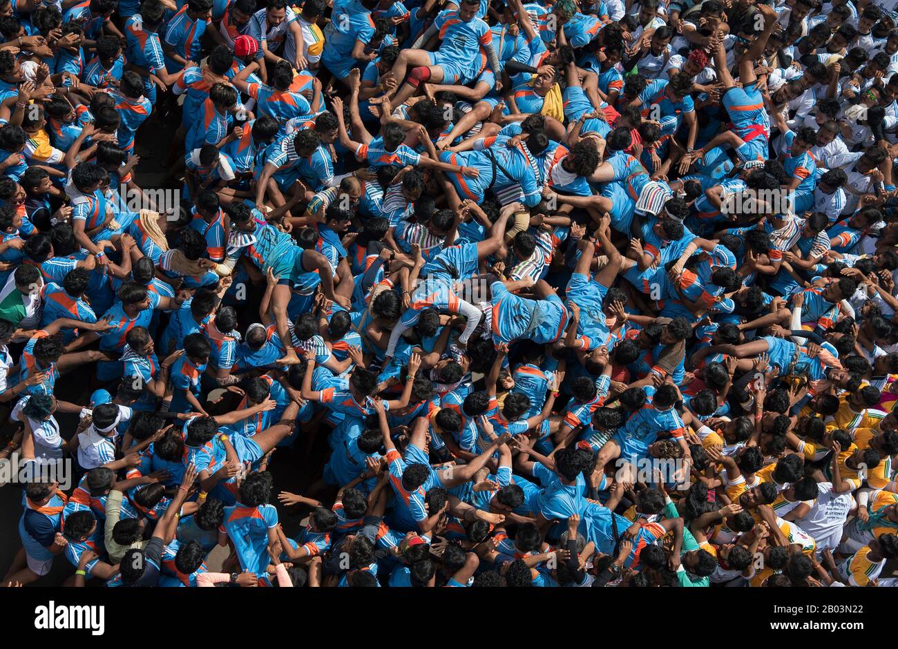 The image of  Govindas fall down while making a human pyramid to reach and break a dahi handi (curd-pot), on occasion of the Janmashtami Festivali at Stock Photo