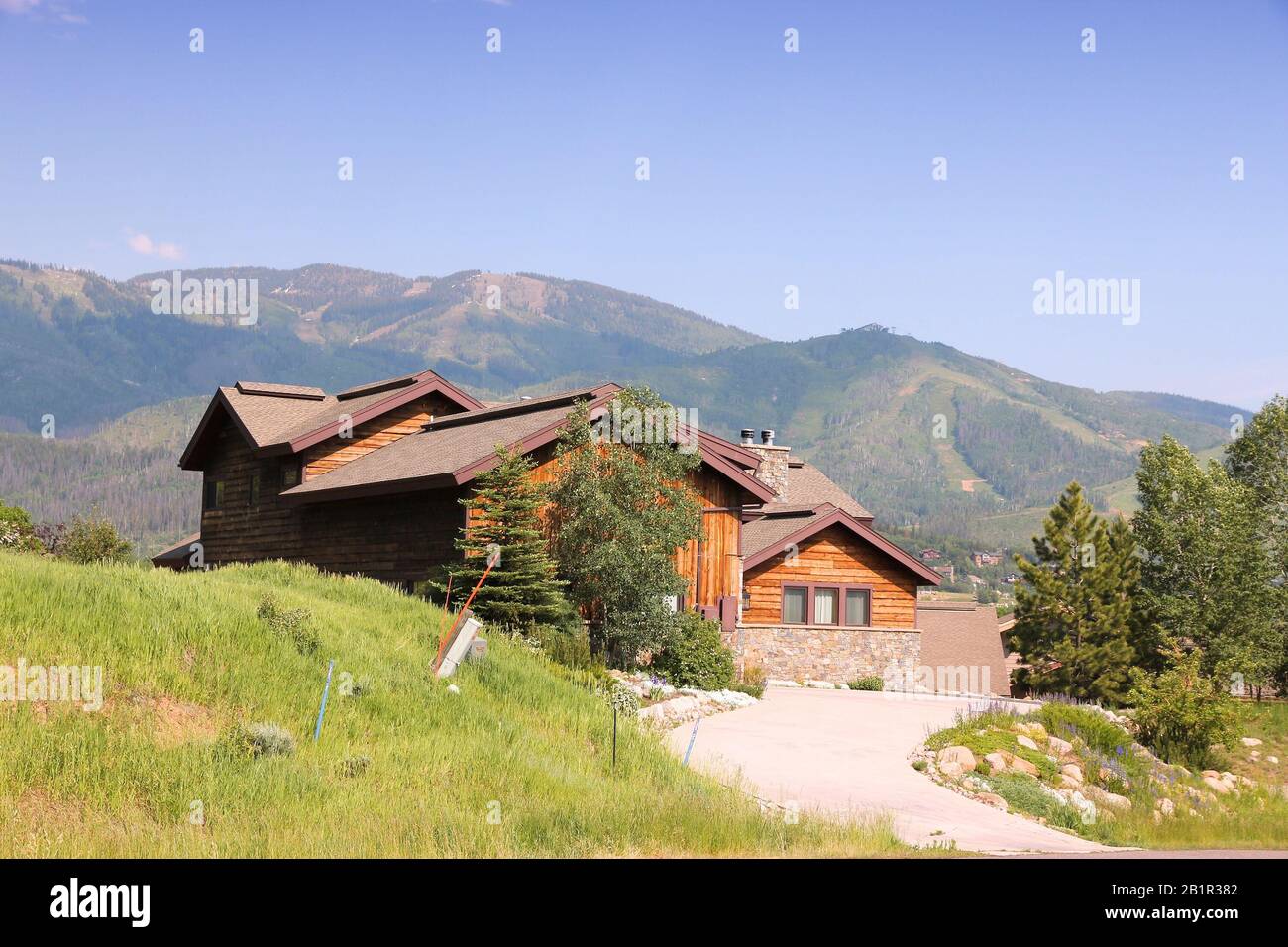 STEAMBOAT SPRINGS, COLORADO - JUNE 19, 2013: Generic house seen from public road in Steamboat Springs, Colorado. Over 5 million homes are sold annuall Stock Photo