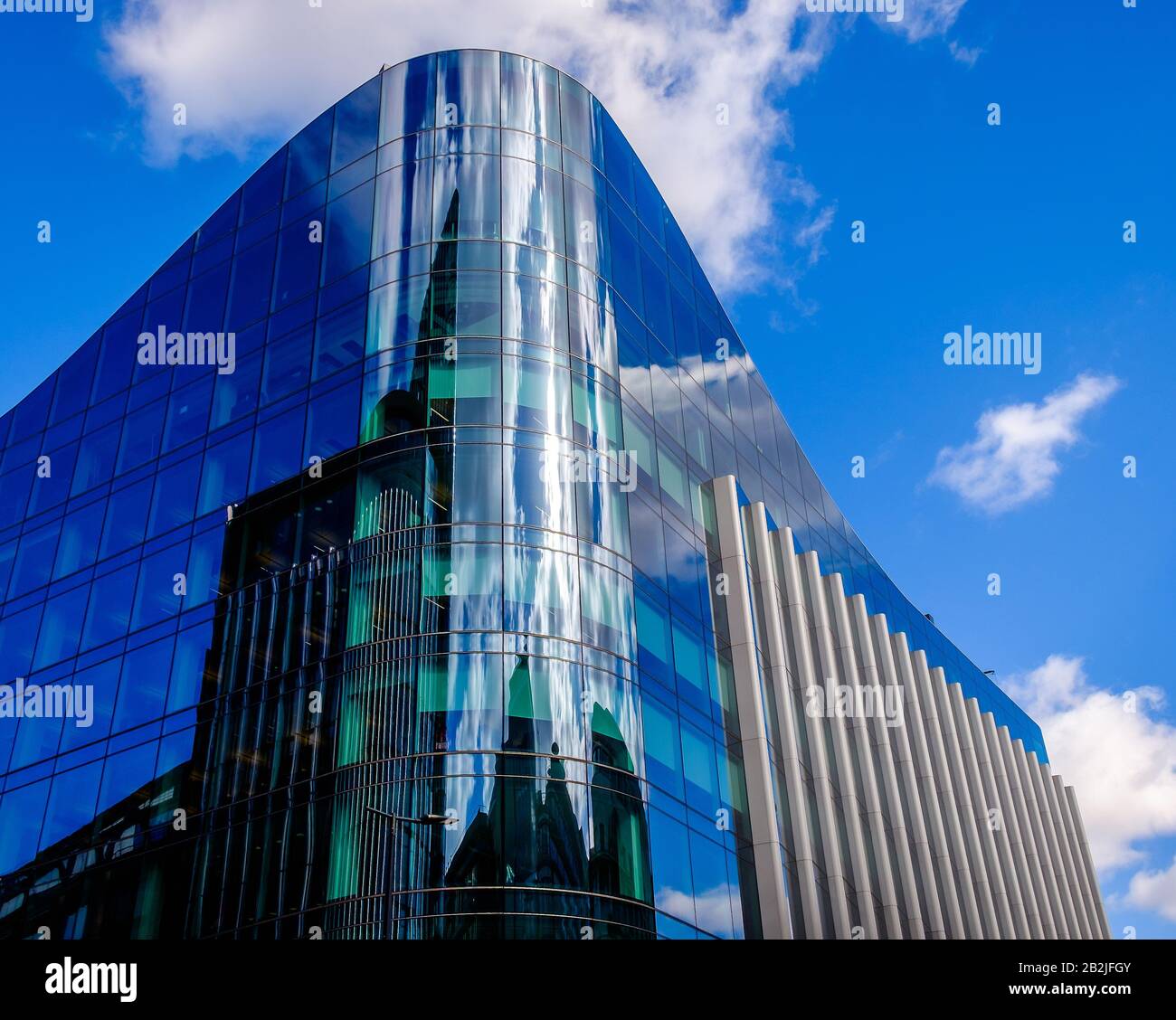 London, UK, March 2019, facade of the top part of the Deloitte Headquarters building Stock Photo