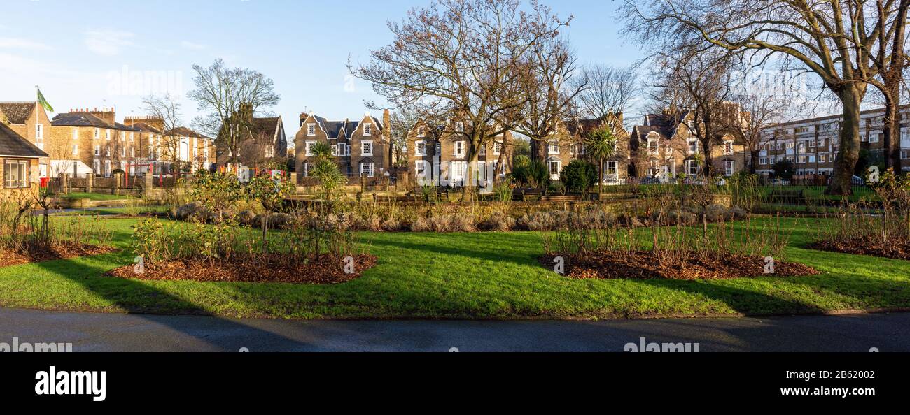 London, England, UK - January 17, 2020: Sun shines on upmarket houses and the public gardens of De Beauvoir Square in Hackney, North London. Stock Photo