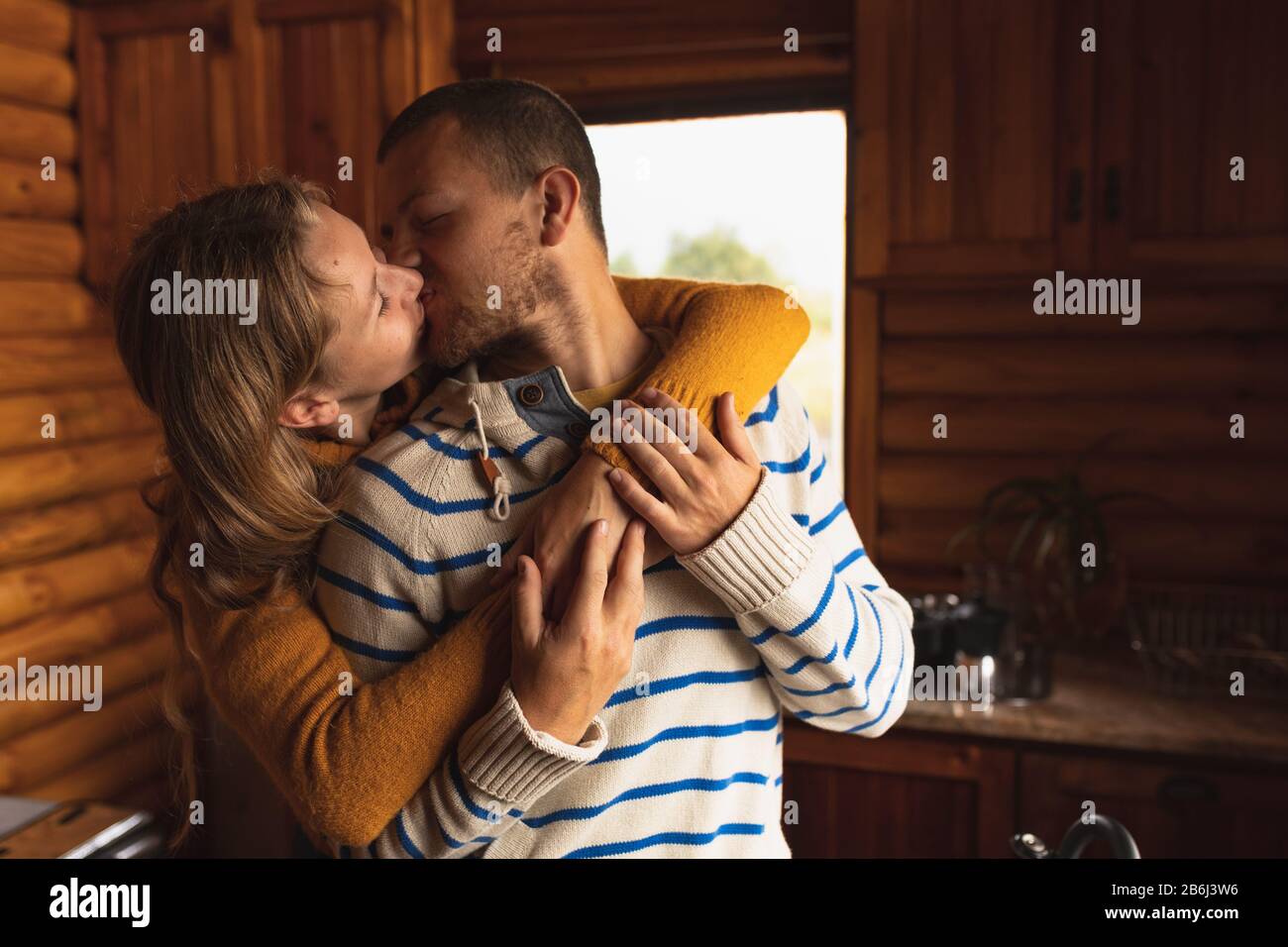 Caucasian couple kissing Stock Photo