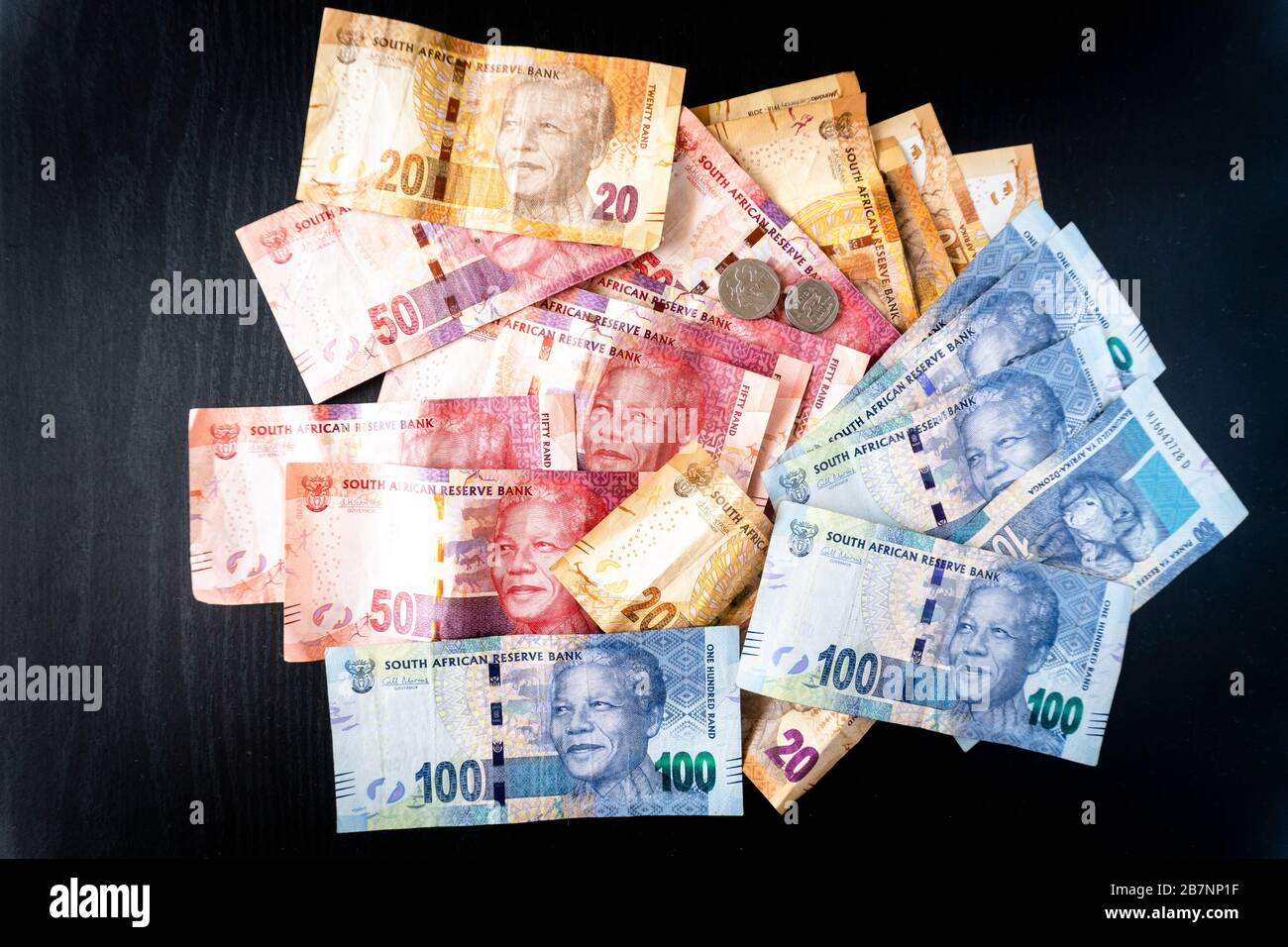 Banknotes and coins of South African currency called Rand Stock Photo