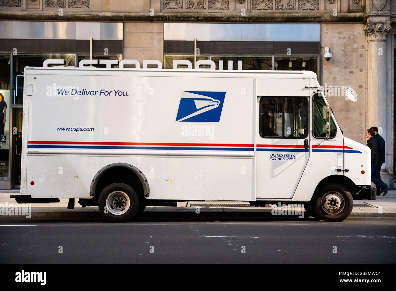 United States Postal Service the USPS logo seen on a delivery vehicle in New York City. Stock Photo