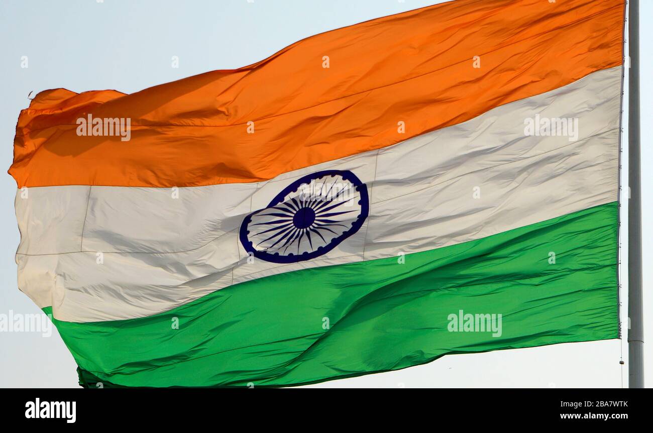 Indian Flag flying in sky Stock Photo