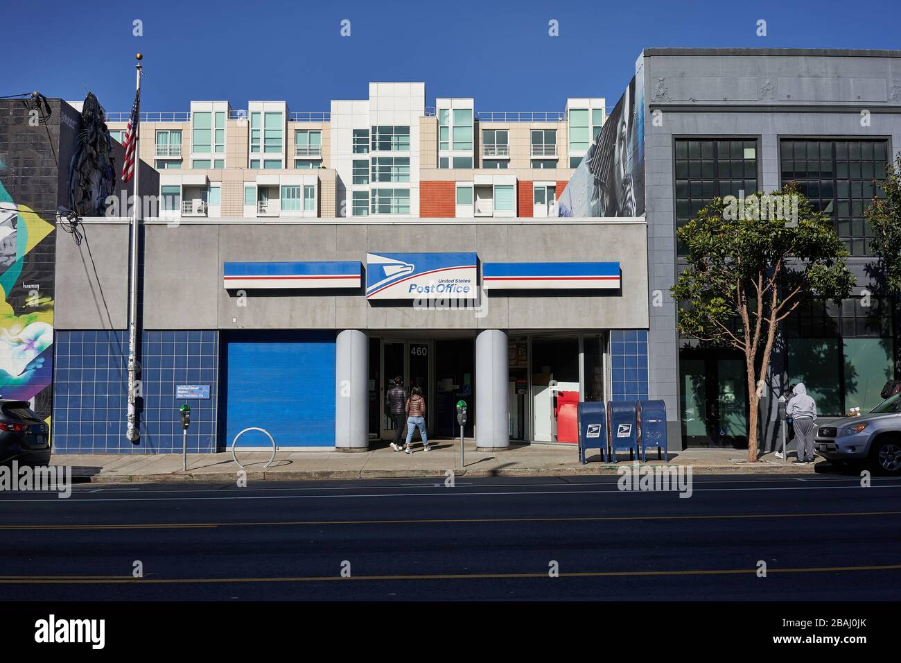 People walk into a USPS post office in the SoMa neighborhood in San Francisco, California, on Sunday, Feb 9, 2020. Stock Photo