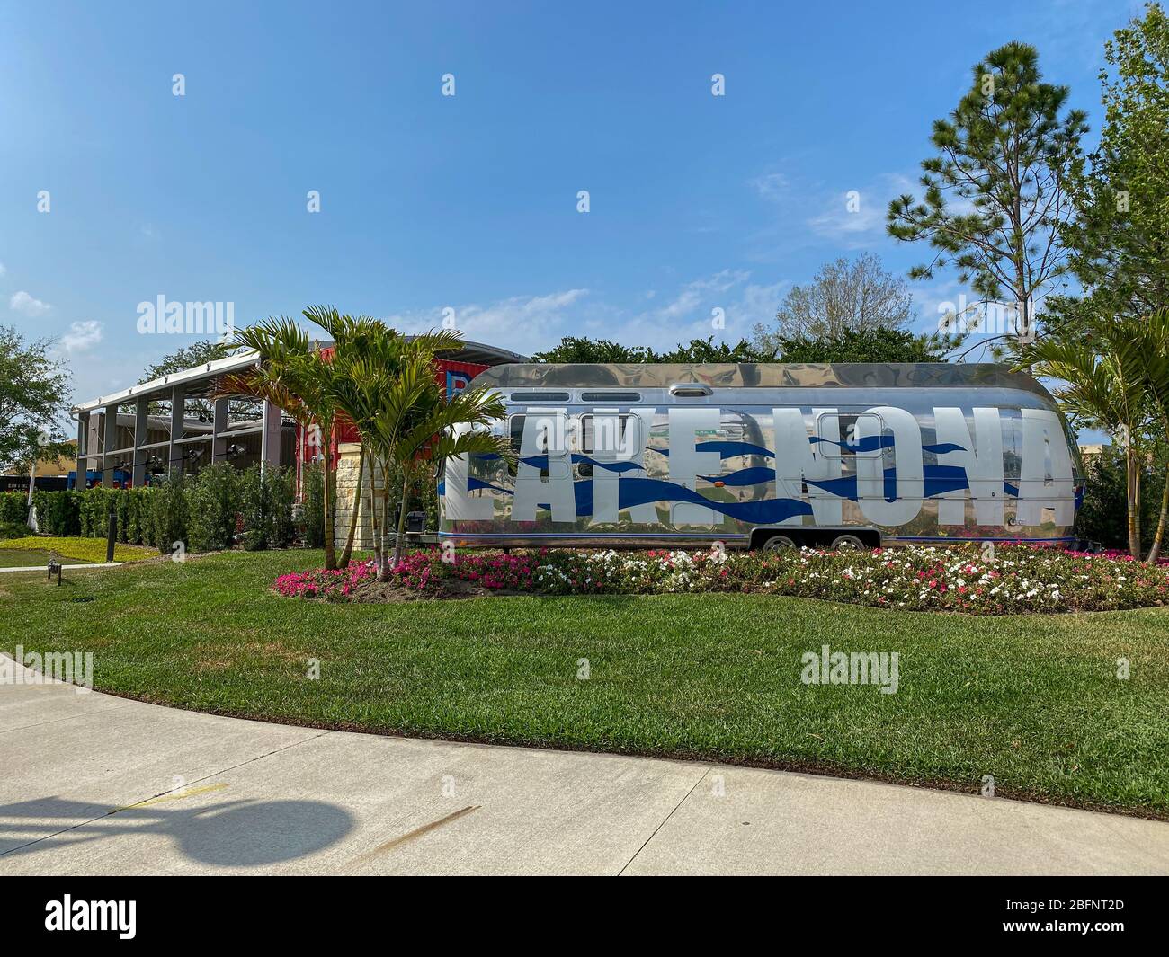 Orlando, FL/USA-4/10/20:  An Airstream Trailer that is painted with the words Lake Nona is the entrance to the Town Center at Lake Nona in Orlando, Fl Stock Photo