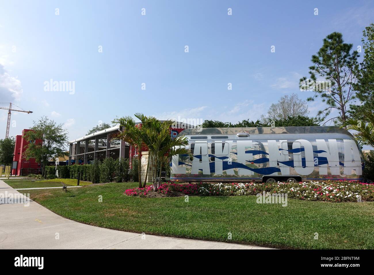 Orlando, FL/USA-4/10/20:  An Airstream Trailer that is painted with the words Lake Nona is the entrance to the Town Center at Lake Nona in Orlando, Fl Stock Photo