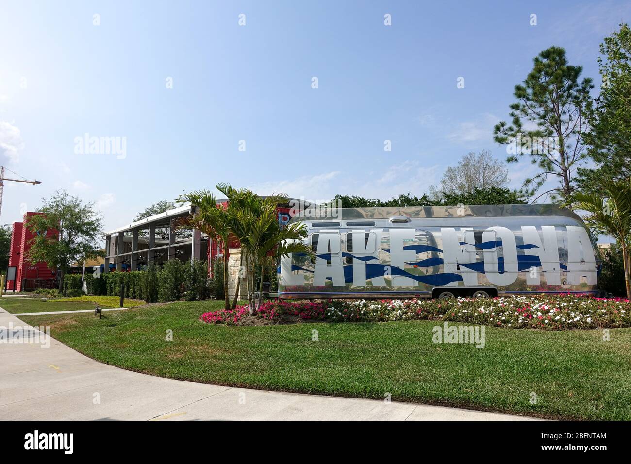 Orlando, FL/USA-4/10/20:  An Airstream Trailer that is painted with the words Lake Nona is the entrance to the Town Center at Lake Nona in Orlando, Fl Stock Photo