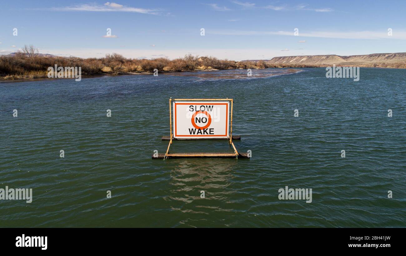 Sign telling people to produce no wake Stock Photo