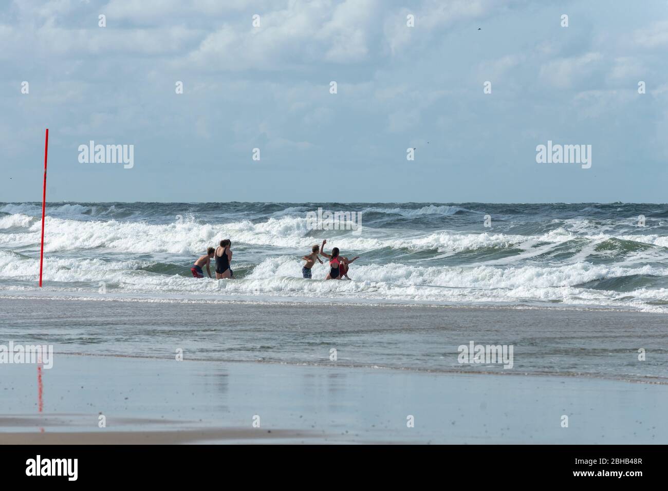 Germany, Lower Saxony, East Frisia, Juist, bathe in the North Sea. Stock Photo