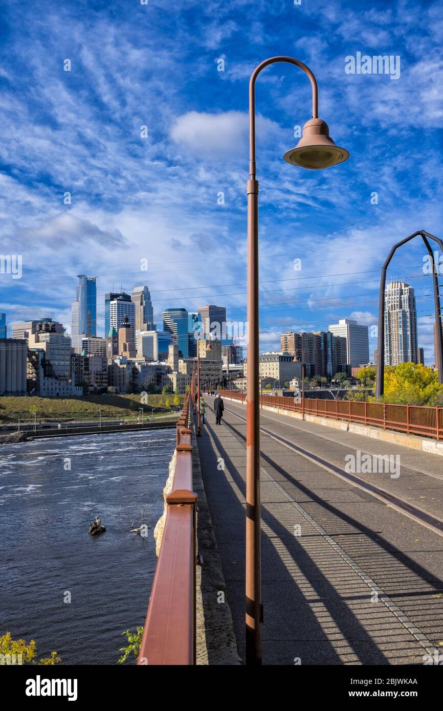 Stone Arch Bridge and Mississippi River and skyline of  Minneapolis,Minnesota. Stock Photo