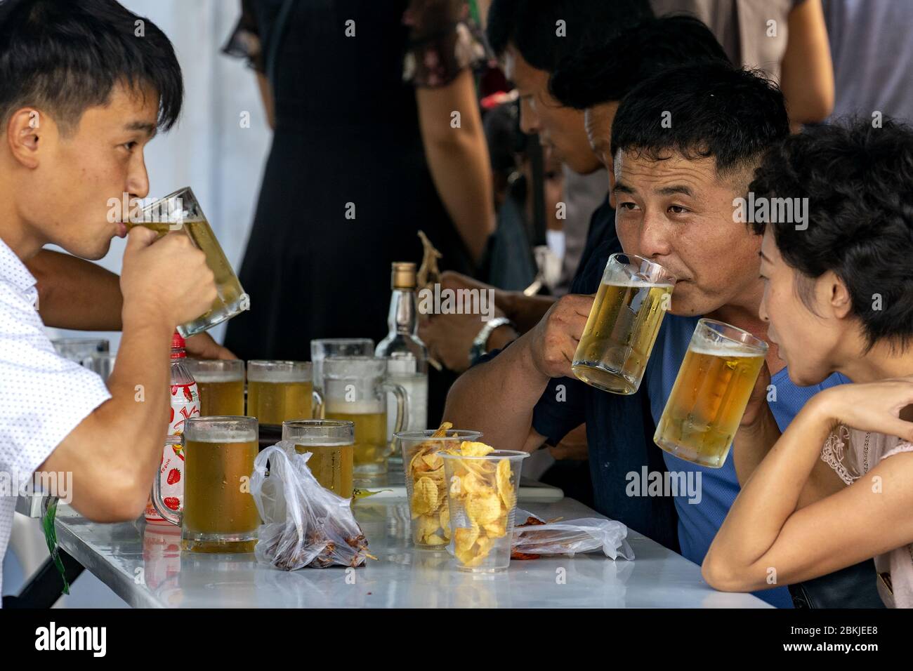 North Korea, Pyongyang, food and beer stall in front of the Kwangbok Supermarket Stock Photo