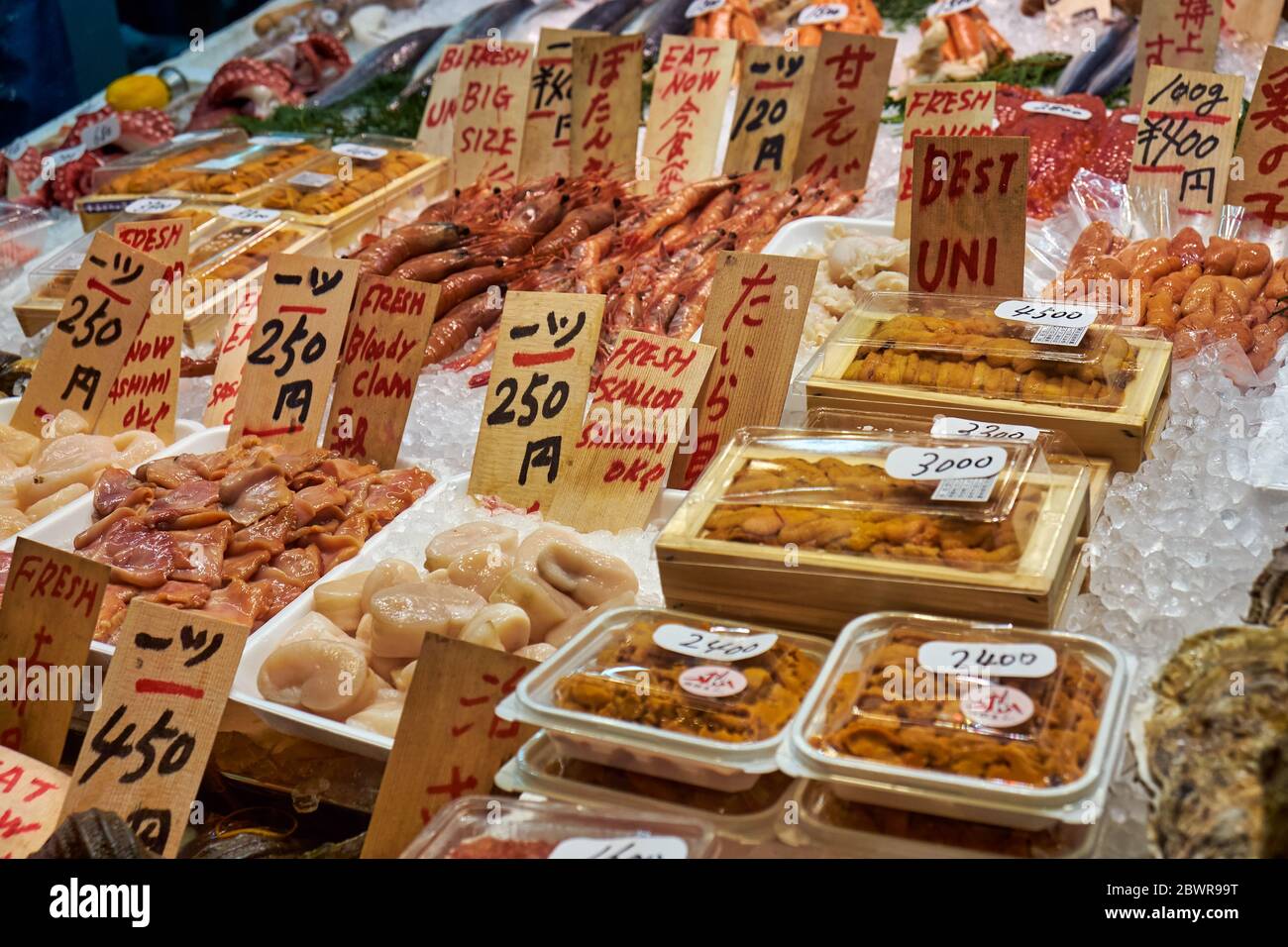 KYOTO, JAPAN - OCTOBER 19, 2019:  Closeup view of different kind of Japanese fresh and fried seafood at the Kyoto market. Japan Stock Photo