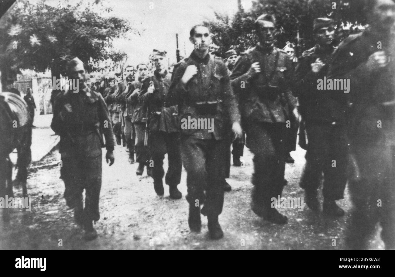 Third Yugoslav partisans' Corps marching through liberated Tuzla in October 1943 Stock Photo