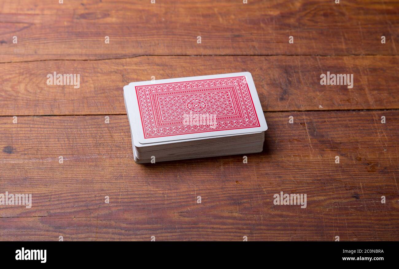 deck of cards on wooden table Stock Photo