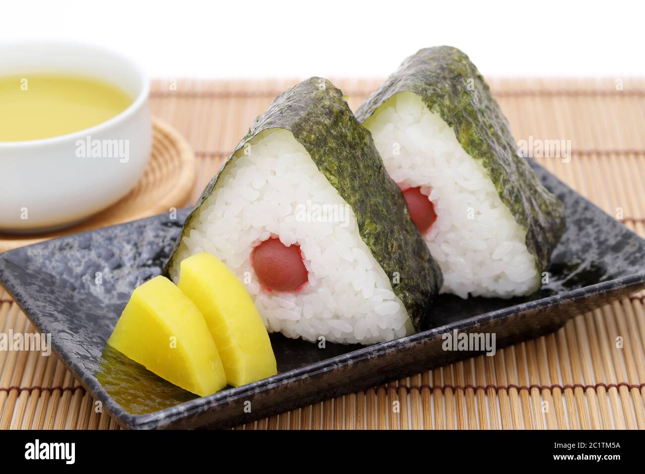 Onigiri, Japanese food, Japanese rice ball, rice triangle with nori and umeboshi Stock Photo