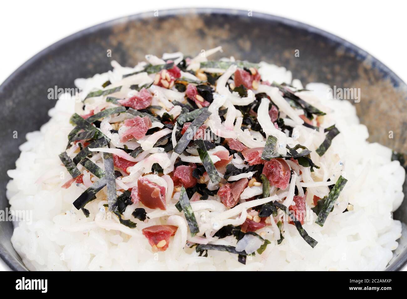 Japanese food, Shirasu and umeboshi on cooked white rice Stock Photo