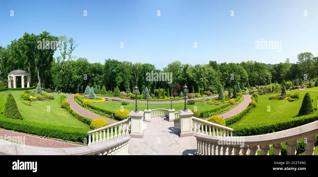 Modern green park from the steps above Stock Photo