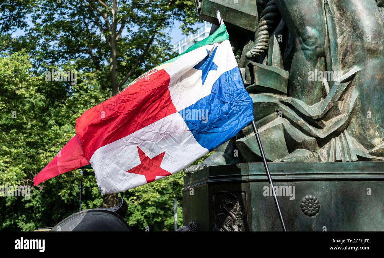 New York, NY - June 19, 2020: Hundreds of people attend at Juneteenth celebration and rally at the Grand Army Plaza where Juneteenth flag seen Stock Photo