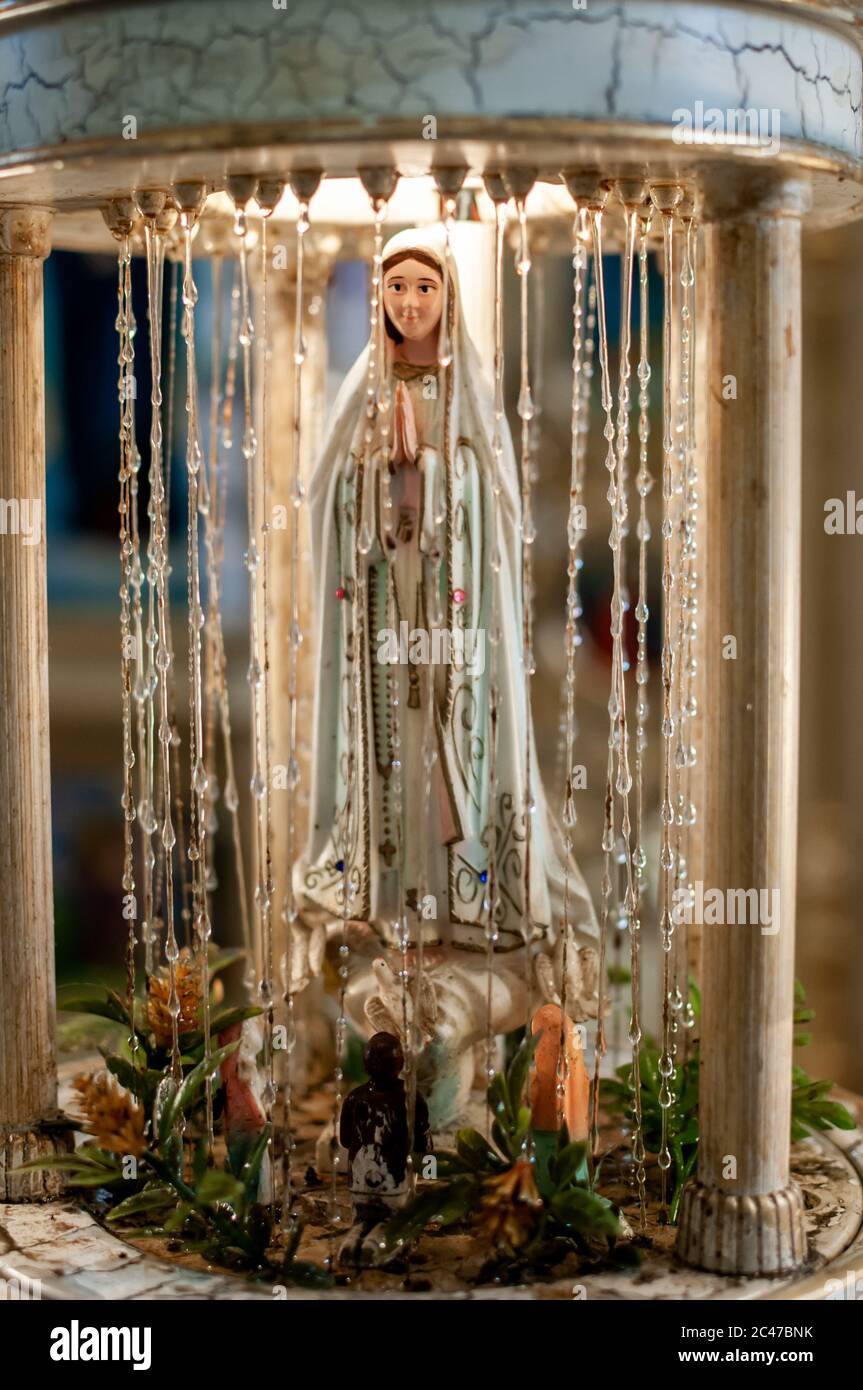 statue of Our Lady in the small altar Stock Photo