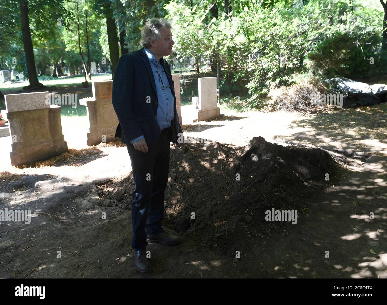 Archaeologists finished exploring with a probe a mass grave of anti-Communist political prisoners at the Prague-Dablice cemetery to find out the exact place where the body of anti-Nazi and anti-Communist fighter Zdena Masinova Sr is buried. Antropologist Petr Veleminsky on a news conference today, on Thursday, July 23, 2020. Her bodily remains are not found. In March, Prague agreed with Zdena Masinova Jr. that the body of her mother would be exhumed. Masinova Sr (1907-1956) was the wife of a hero of the anti-Nazi resistance movement, Lieutenant Colonel Josef Masin, who was shot dead by the Naz Stock Photo