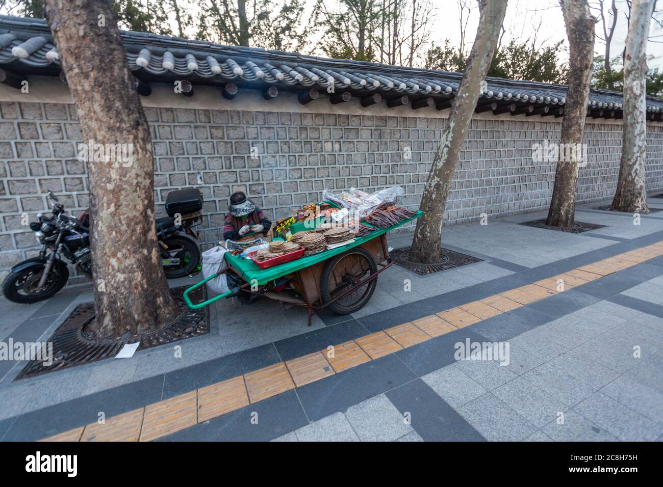 Street vendor in a stall near Seoul Plaza,  Seoul, South Korea Stock Photo