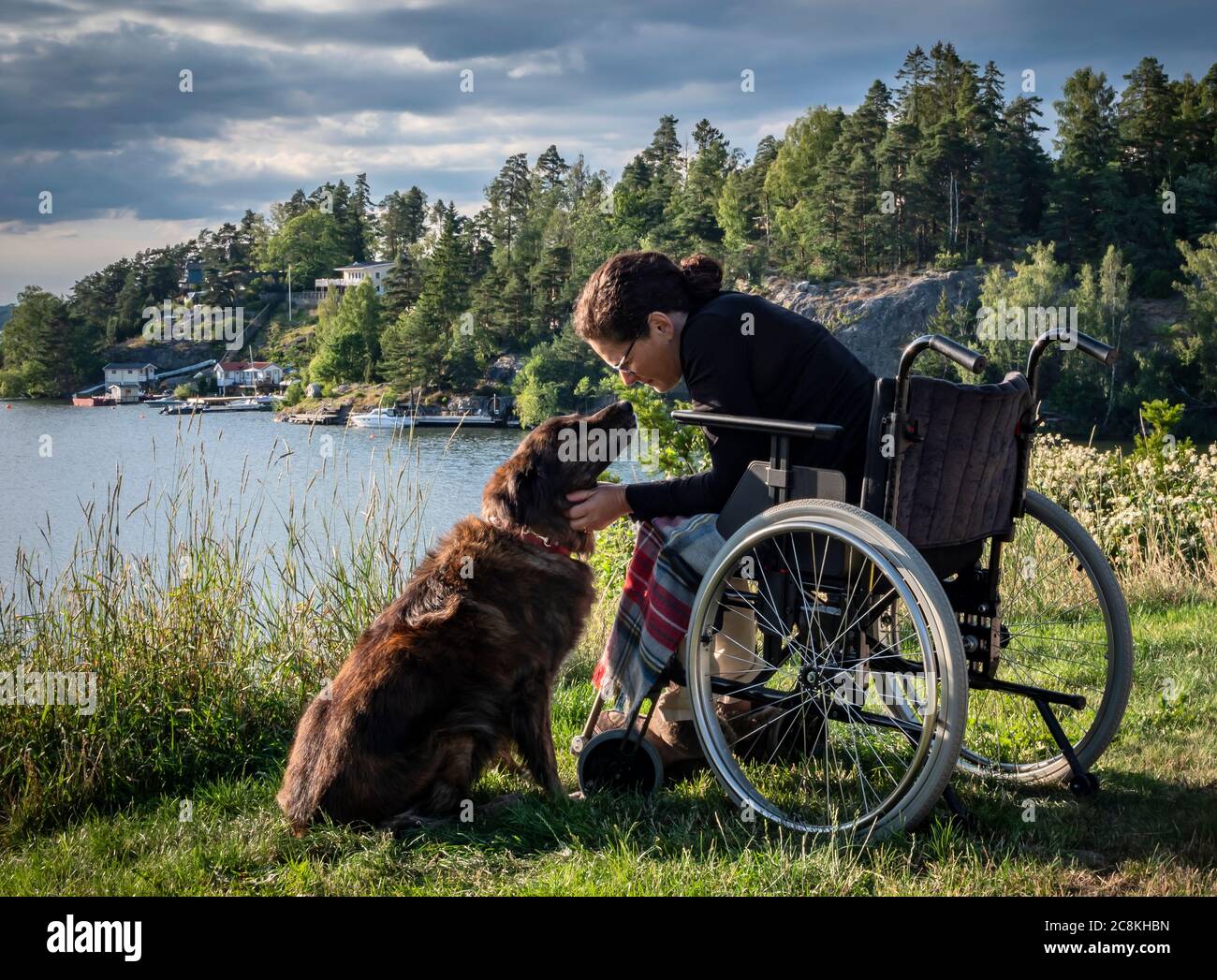 Woman in wheelchair Stock Photo