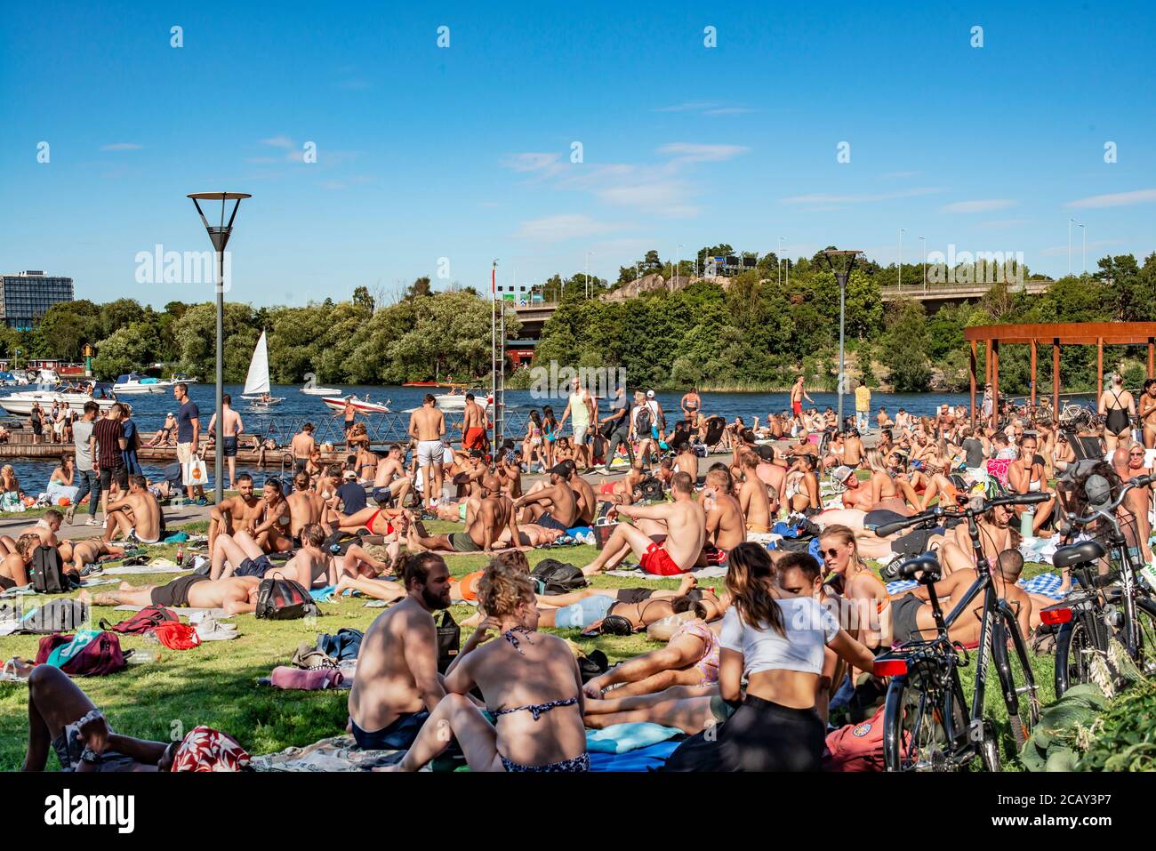 STOCKHOLM, SWEDEN - AUG 08, 2020: Sunbathers at Hornsbergsstrand Stock Photo