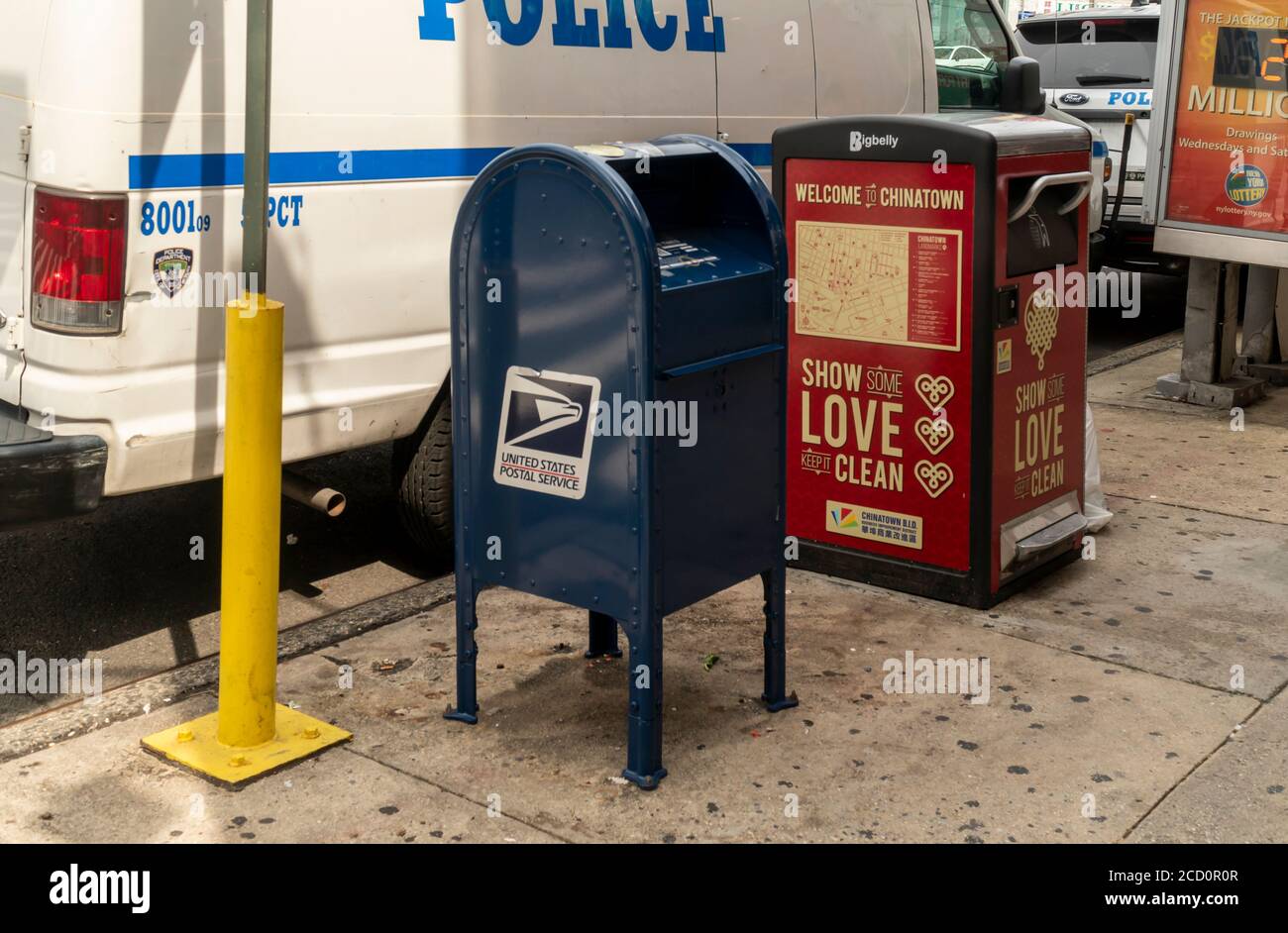 USPS postal collection letterbox in Chinatown in New York on Saturday, August 15, 2020 (© Richard B. Levine) Stock Photo