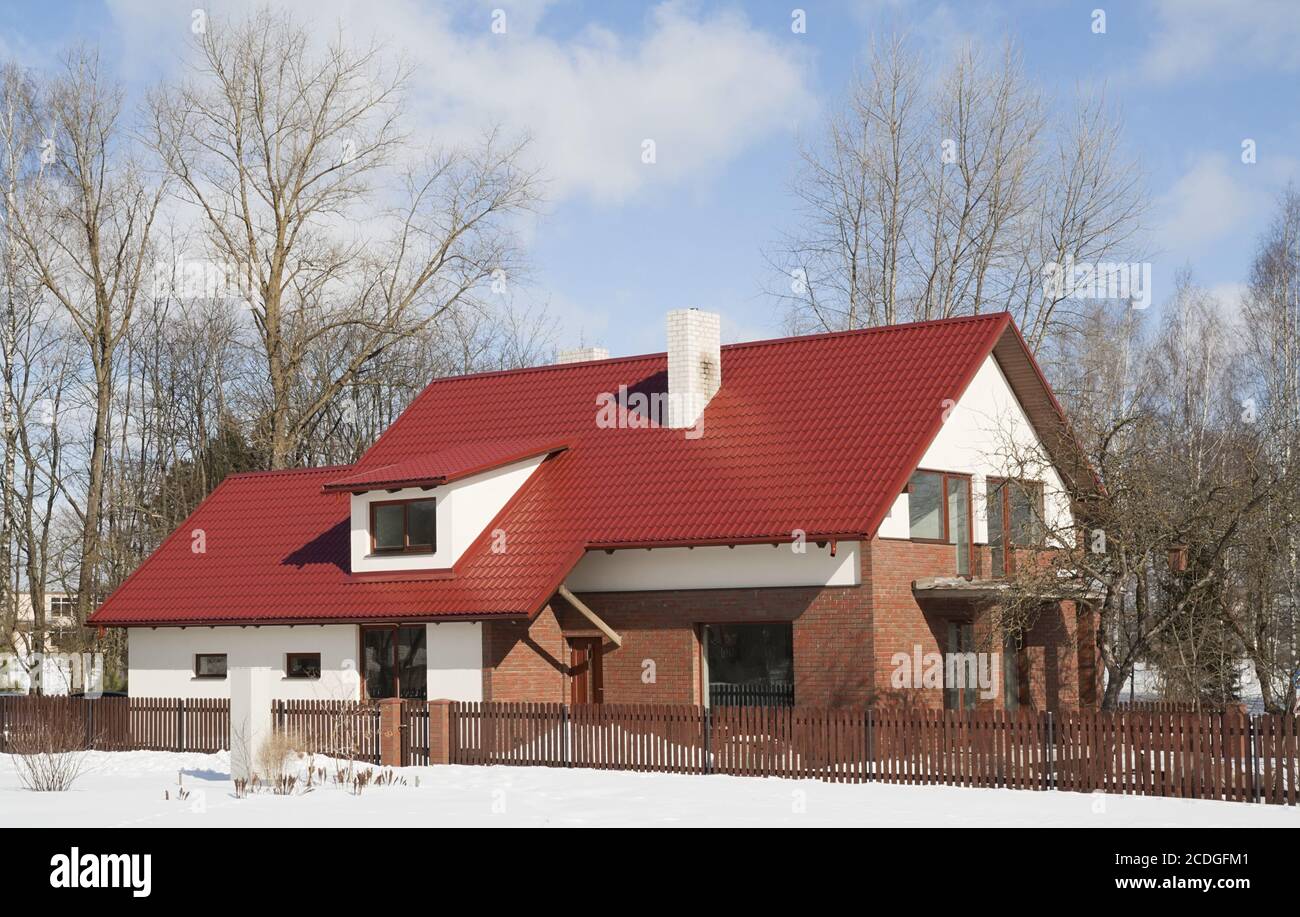 Modern European mass rural building Stock Photo