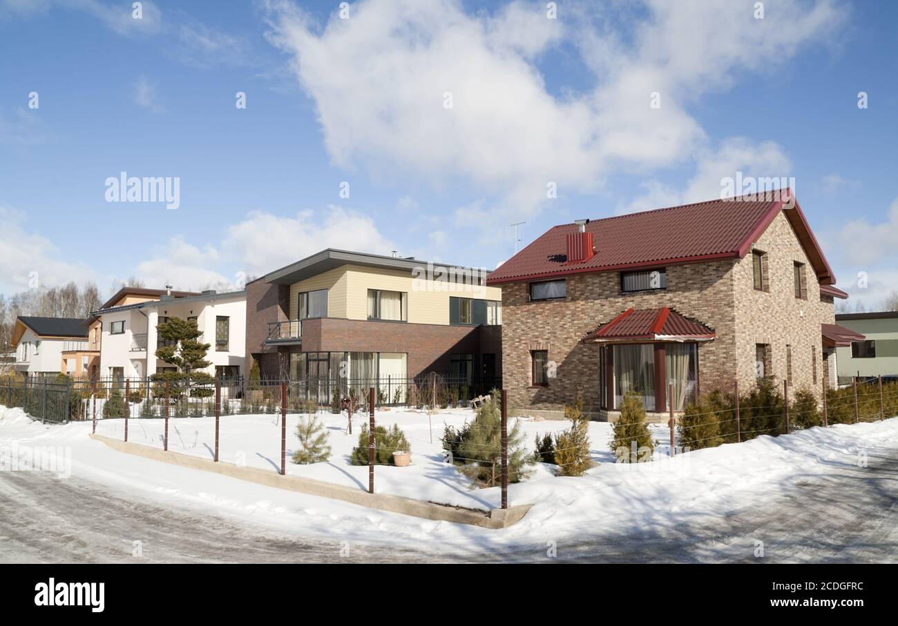 Modern European mass rural building Stock Photo